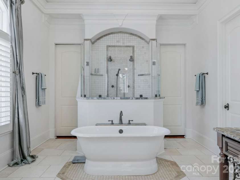 3255 Lake Pointe Drive, Belmont, NC 28012.  MLS# CAR4211520, YatesRealty ID 689. Stand alone tub and custom shower