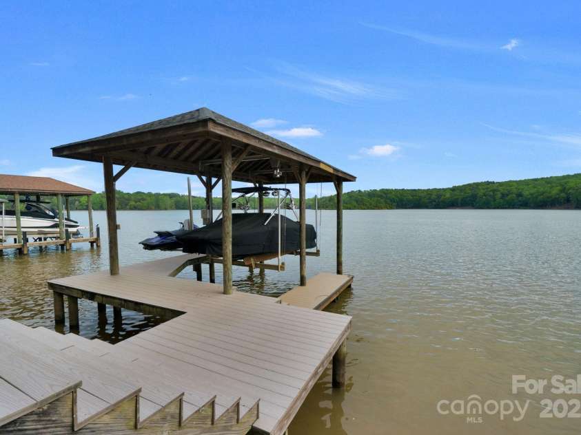 3255 Lake Pointe Drive, Belmont, NC 28012.  MLS# CAR4211520, YatesRealty ID 689. Trex covered pier and boat lift