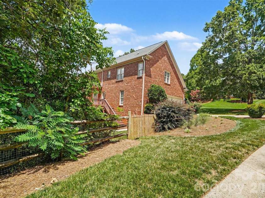 4837 Beth Lane, Harrisburg, NC 28075.  MLS# CAR4353100, YatesRealty ID 6895. Sidewalk from driveway to basement. 