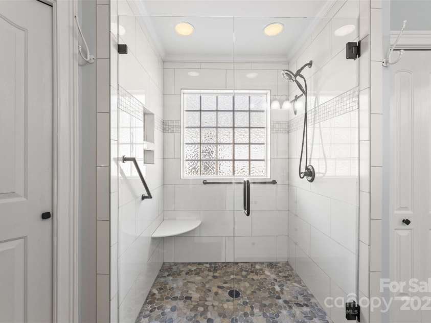 801 Toncin Avenue, Bessemer City, NC 28016.  MLS# CAR4237256, YatesRealty ID 6897. Large walk-in shower