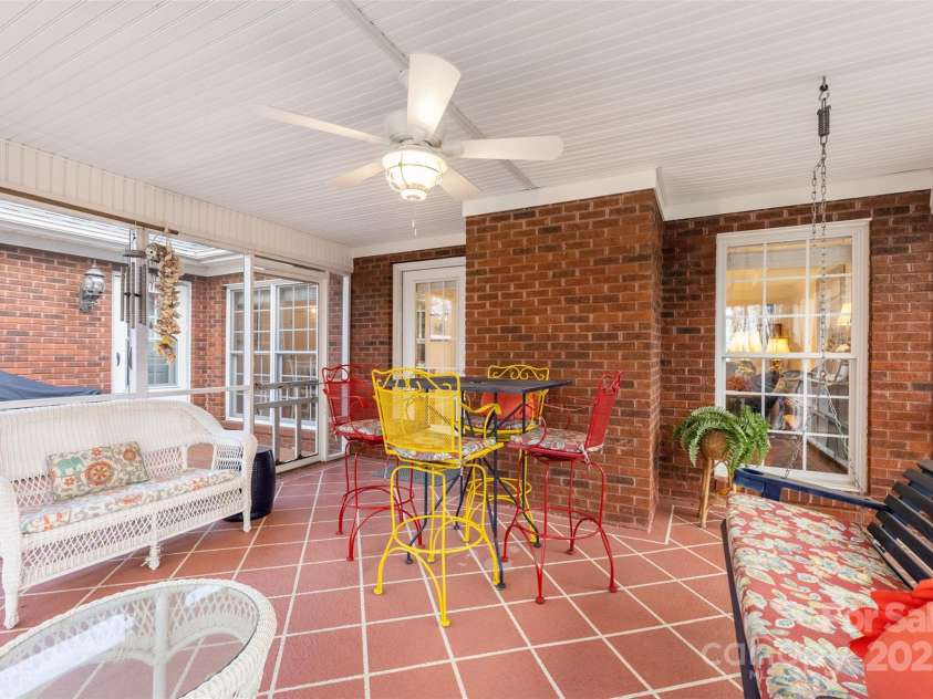 801 Toncin Avenue, Bessemer City, NC 28016.  MLS# CAR4237256, YatesRealty ID 6897. Porch with swing