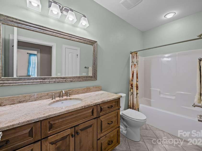 8657 Sonata Court, Denver, NC 28037.  MLS# CAR4321680, YatesRealty ID 690. 2nd full bathroom on main level