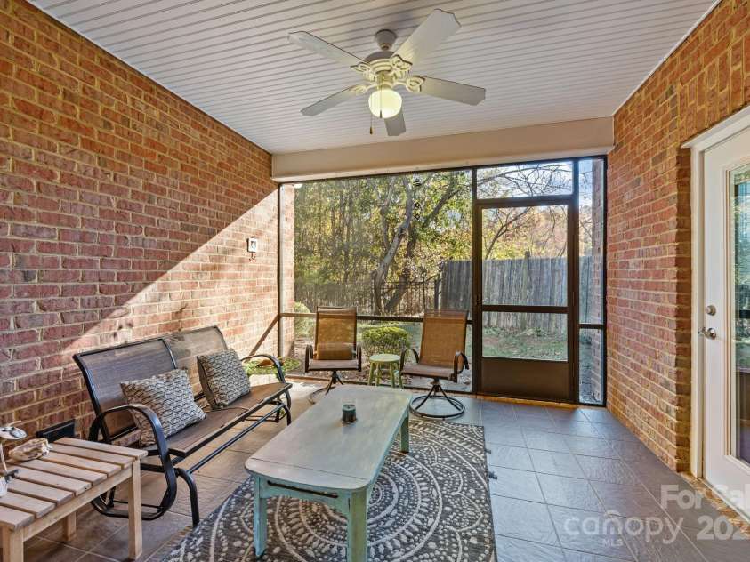 8657 Sonata Court, Denver, NC 28037.  MLS# CAR4321680, YatesRealty ID 690. Beyond the double doors is the screened porch retreat