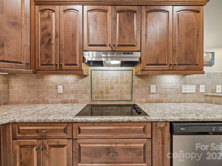 8657 Sonata Court, Denver, NC 28037.  MLS# CAR4321680, YatesRealty ID 690. Cooktop with vent hood
