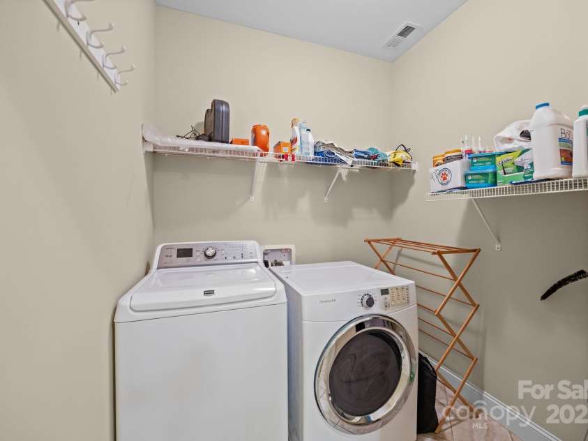 8657 Sonata Court, Denver, NC 28037.  MLS# CAR4321680, YatesRealty ID 690. Laundry room just off of the garage entrance