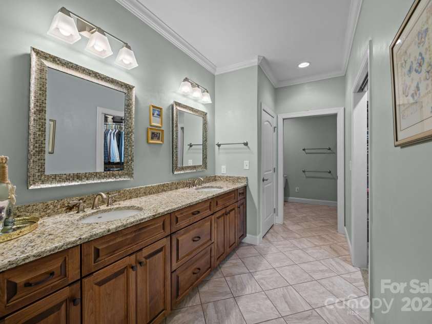 8657 Sonata Court, Denver, NC 28037.  MLS# CAR4321680, YatesRealty ID 690. Primary bath w/ dual, oversized vanities