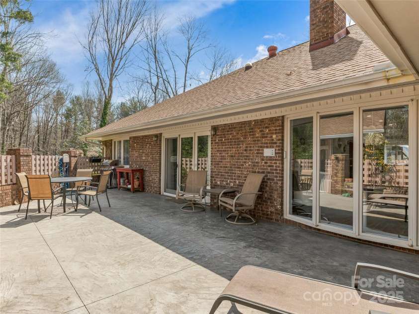 34 Glen Crest Drive, Arden, NC 28704.  MLS# CAR4238682, YatesRealty ID 6900. Easy access from Living Room, Kitchen, and Primary Bedroom