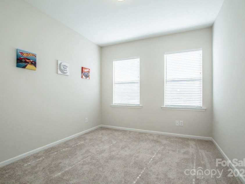 1270 Brawley School Road, Mooresville, NC 28117.  MLS# CAR4318407, YatesRealty ID 6902. Front Bedroom 1 