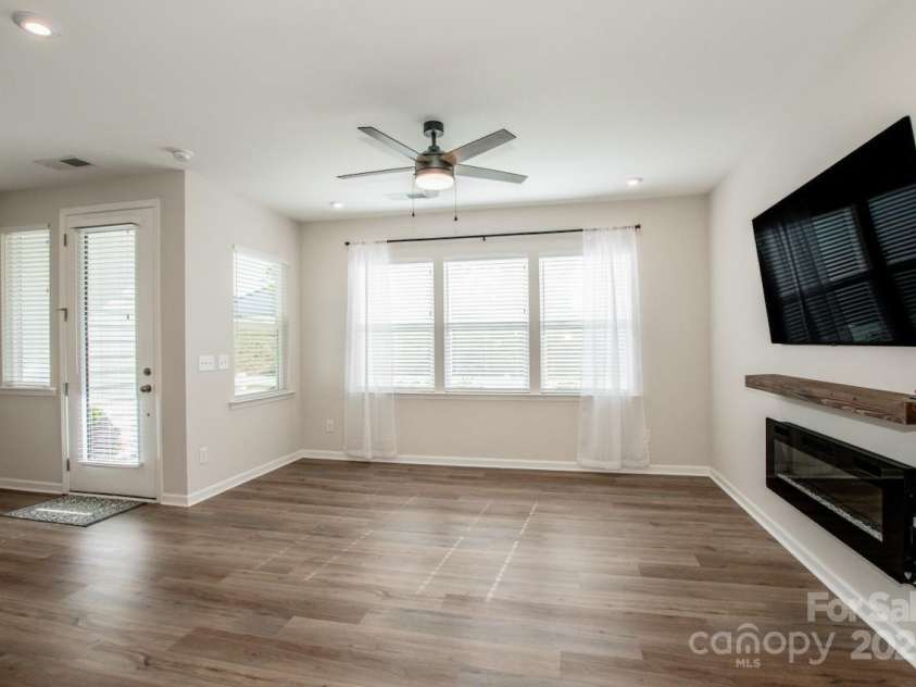 1270 Brawley School Road, Mooresville, NC 28117.  MLS# CAR4318407, YatesRealty ID 6902. Includes Ceiling fan and Electric Fireplace & Mantle