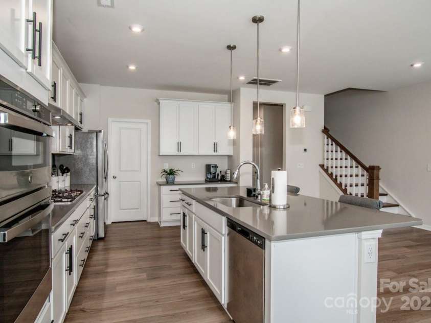 1270 Brawley School Road, Mooresville, NC 28117.  MLS# CAR4318407, YatesRealty ID 6902. Large island w/Grey Quartz Countertops