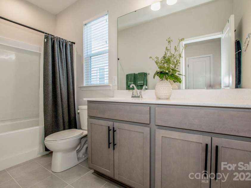 1270 Brawley School Road, Mooresville, NC 28117.  MLS# CAR4318407, YatesRealty ID 6902. Upstairs Hall bathroom with Tub/Shower