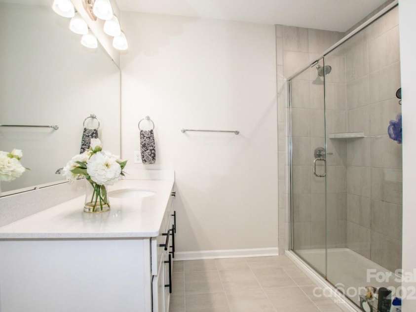 1270 Brawley School Road, Mooresville, NC 28117.  MLS# CAR4318407, YatesRealty ID 6902. Walk in Shower