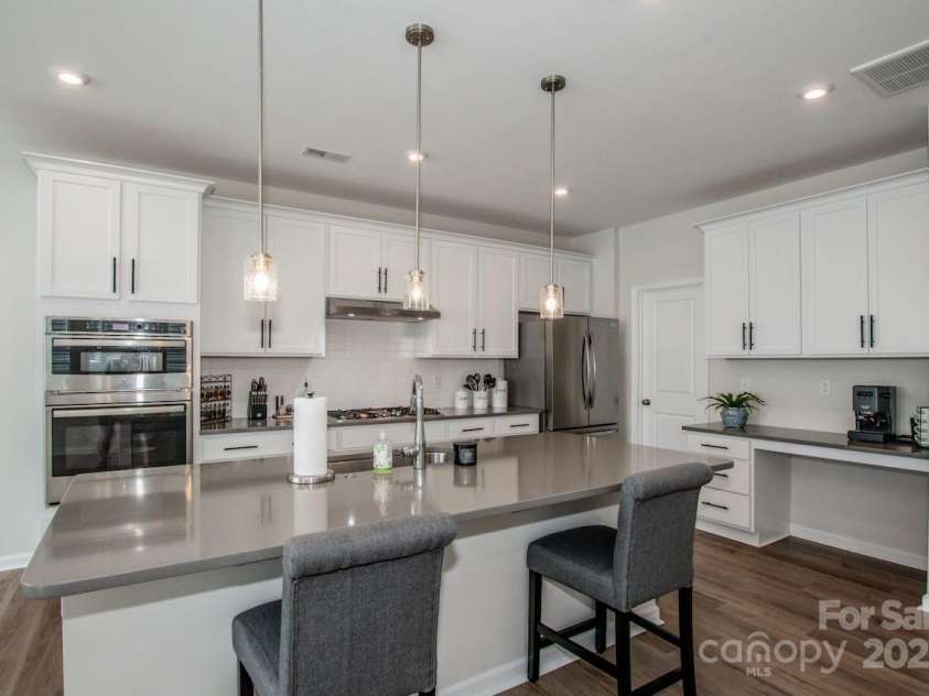 1270 Brawley School Road, Mooresville, NC 28117.  MLS# CAR4318407, YatesRealty ID 6902. White Shaker doors & Quartz Countertops