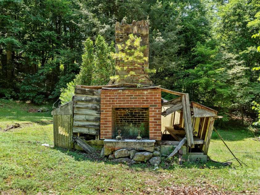 240+ and 252 General Hill Road, Flat Rock, NC 28731.  MLS# CAR4234844, YatesRealty ID 6906. Remnant of cabin built by the owners' grandfather.