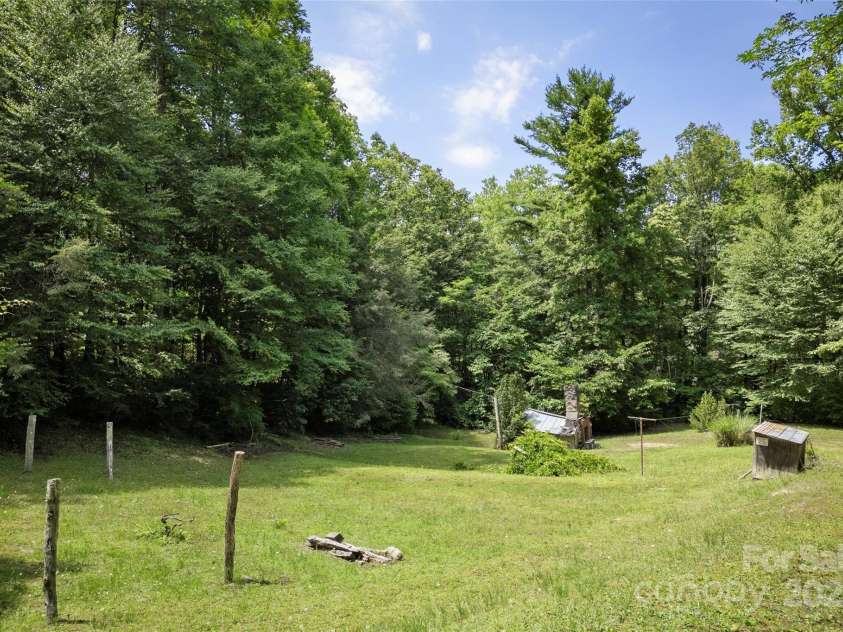 240+ and 252 General Hill Road, Flat Rock, NC 28731.  MLS# CAR4234844, YatesRealty ID 6906. Tract 1 land parcel contains two home sites with septic and well in place.