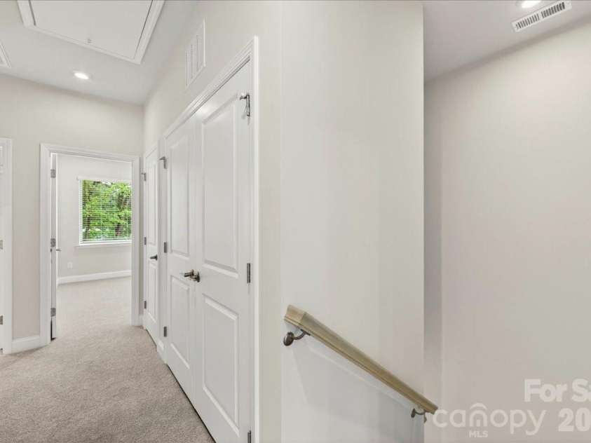 921 Archway Lane, Charlotte, NC 28217.  MLS# CAR4318568, YatesRealty ID 6910. Third floor landing 