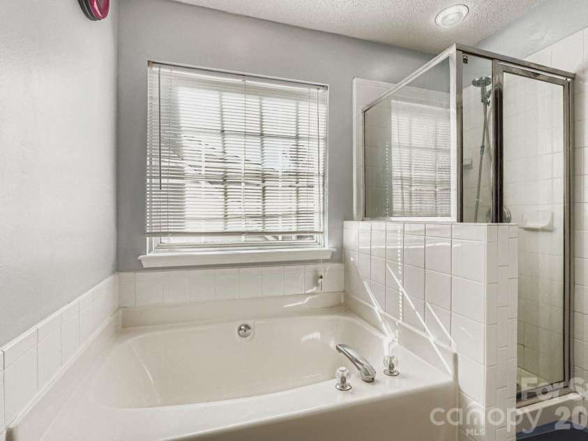 10303 Baskerville Avenue, Charlotte, NC 28269.  MLS# CAR4400036, YatesRealty ID 6912. Bathroom