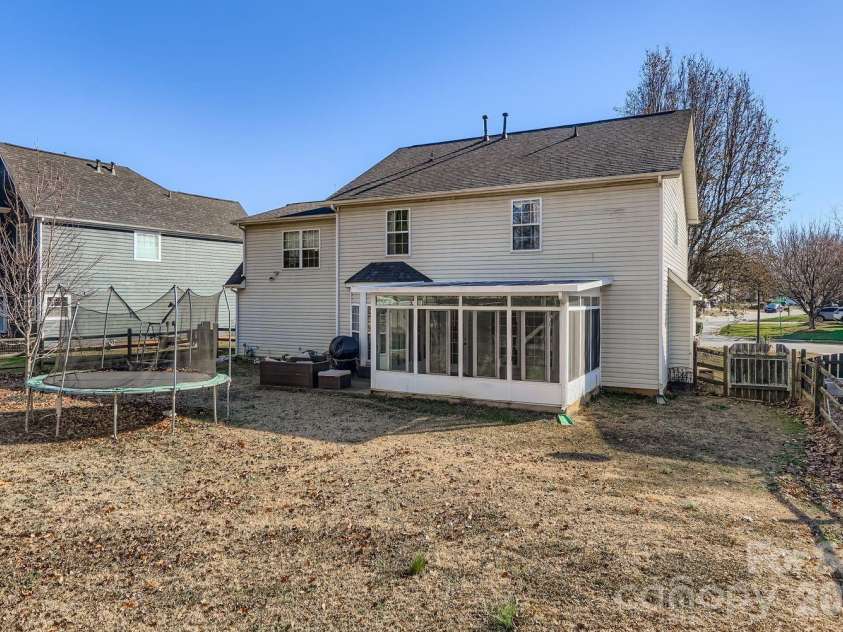 10303 Baskerville Avenue, Charlotte, NC 28269.  MLS# CAR4400036, YatesRealty ID 6912. Exterior - Back
