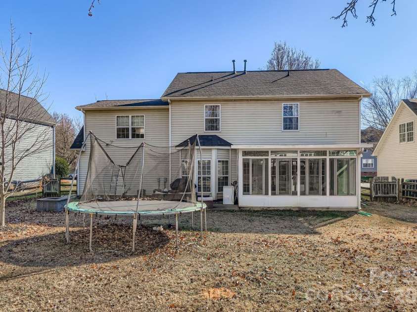 10303 Baskerville Avenue, Charlotte, NC 28269.  MLS# CAR4400036, YatesRealty ID 6912. Exterior - Back