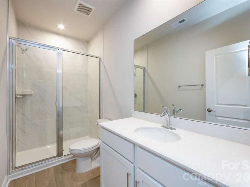 8030 Cedarsmith Court, Charlotte, NC 28217.  MLS# CAR4353004, YatesRealty ID 6914. First Floor Full Bathroom