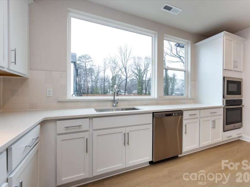 8030 Cedarsmith Court, Charlotte, NC 28217.  MLS# CAR4353004, YatesRealty ID 6914. Gourmet Kitchen with Large Windows