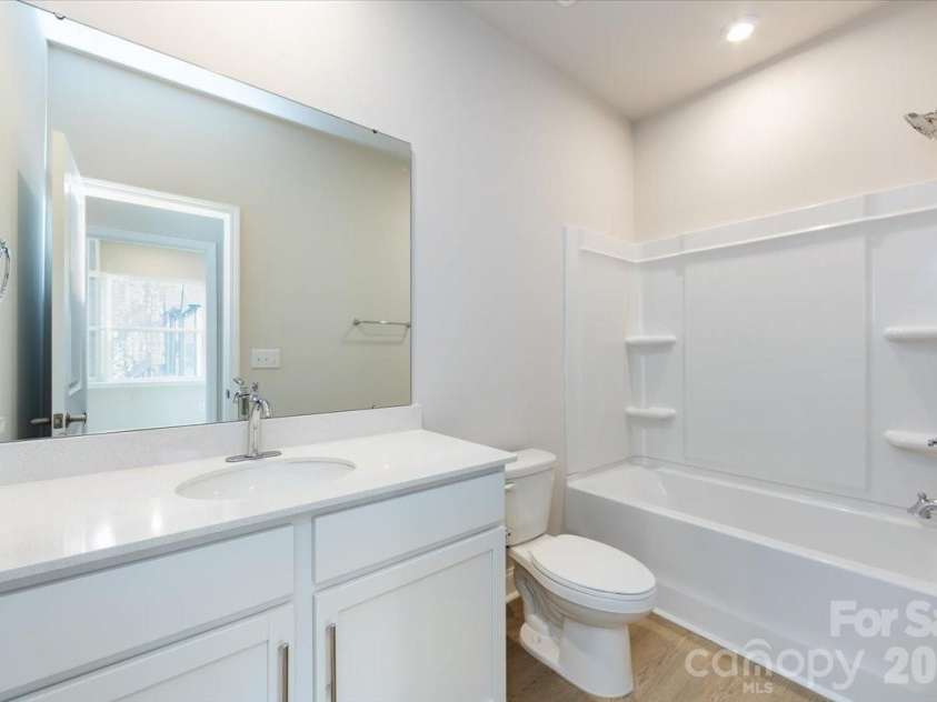 8030 Cedarsmith Court, Charlotte, NC 28217.  MLS# CAR4353004, YatesRealty ID 6914. Secondary Bathroom