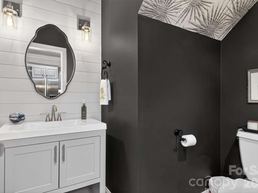 5300 Beritstrasse Court, Charlotte, NC 28277.  MLS# CAR4360661, YatesRealty ID 6917. Updated half bath on the main floor