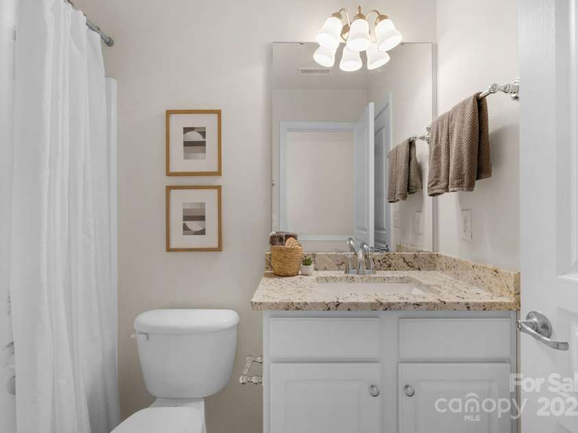 2136 Ashley River Road, Waxhaw, NC 28173.  MLS# CAR4243691, YatesRealty ID 6919. 3rd full bathroom on the second floor with new granite counter, sink and faucet