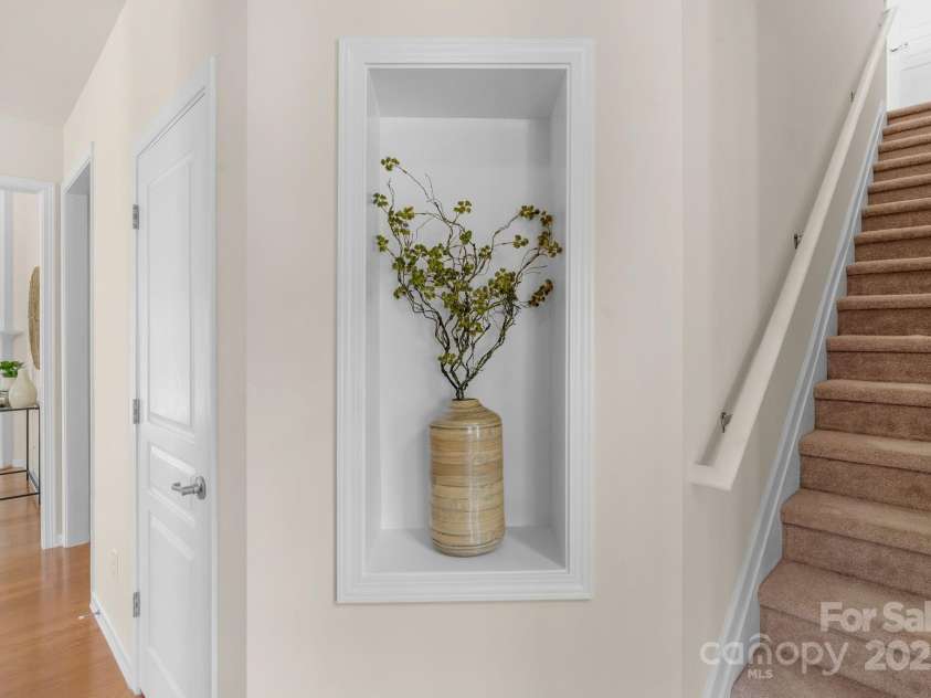 2136 Ashley River Road, Waxhaw, NC 28173.  MLS# CAR4243691, YatesRealty ID 6919. Beautiful, recessed decorator shelf and 2nd level stair access from the foyer