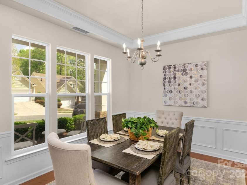 2136 Ashley River Road, Waxhaw, NC 28173.  MLS# CAR4243691, YatesRealty ID 6919. Formal dining room with tray ceiling and picture-frame molding