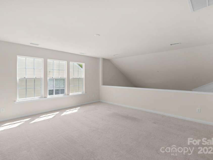 2136 Ashley River Road, Waxhaw, NC 28173.  MLS# CAR4243691, YatesRealty ID 6919. Huge bonus/Loft space on the second floor that overlooks the great room