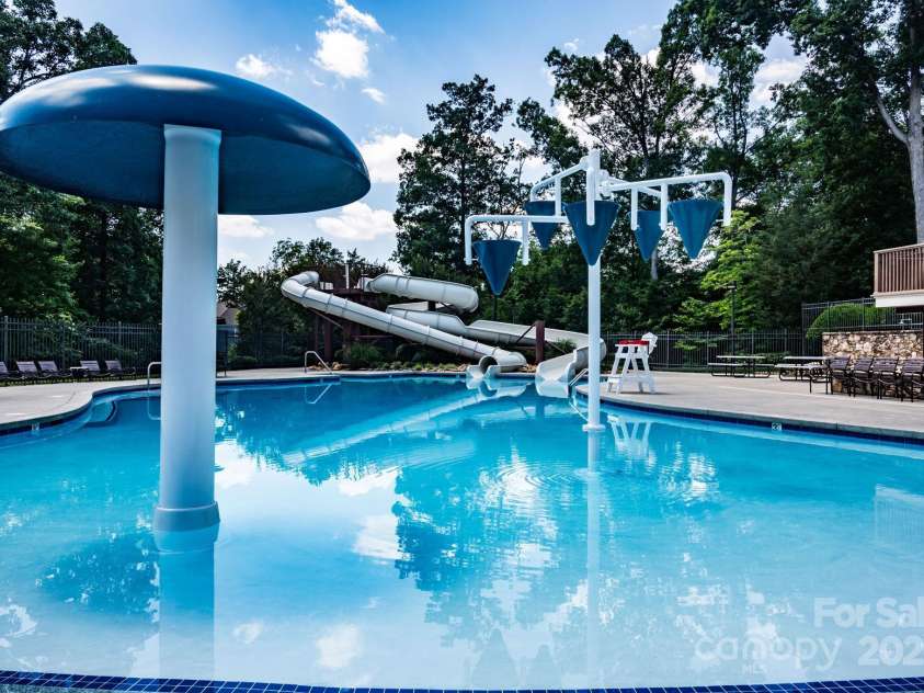 2136 Ashley River Road, Waxhaw, NC 28173.  MLS# CAR4243691, YatesRealty ID 6919. One of Lawson's 3 pools with zero entry and water features/slides