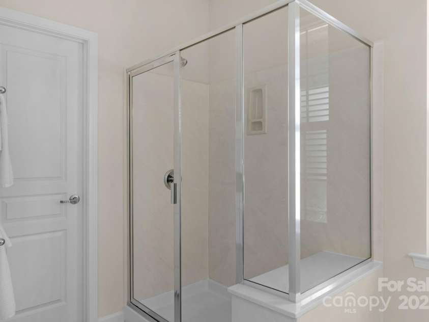 2136 Ashley River Road, Waxhaw, NC 28173.  MLS# CAR4243691, YatesRealty ID 6919. Primary shower and walk-in-closet access