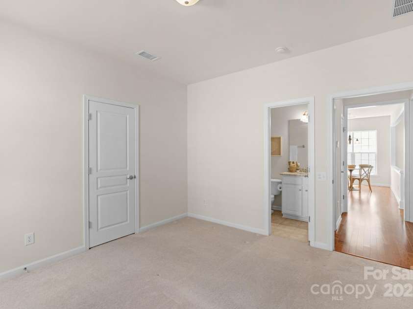 2136 Ashley River Road, Waxhaw, NC 28173.  MLS# CAR4243691, YatesRealty ID 6919. Secondary bedroom with direct full bathroom access