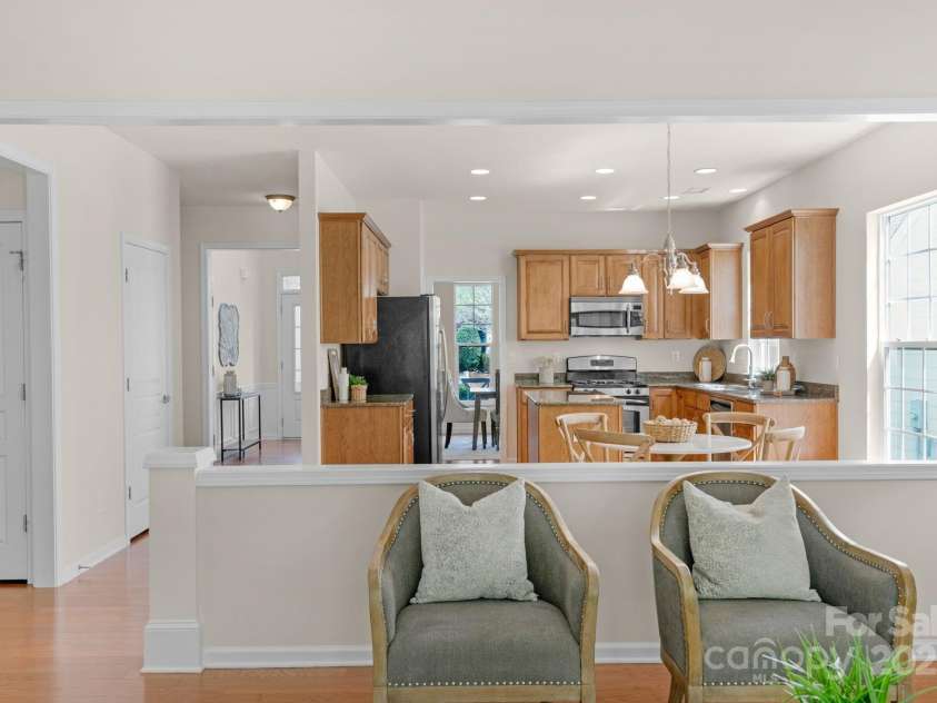 2136 Ashley River Road, Waxhaw, NC 28173.  MLS# CAR4243691, YatesRealty ID 6919. View from great room into the kitchen