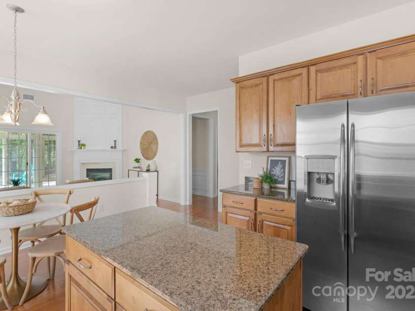 2136 Ashley River Road, Waxhaw, NC 28173.  MLS# CAR4243691, YatesRealty ID 6919. View from kitchen into the great room