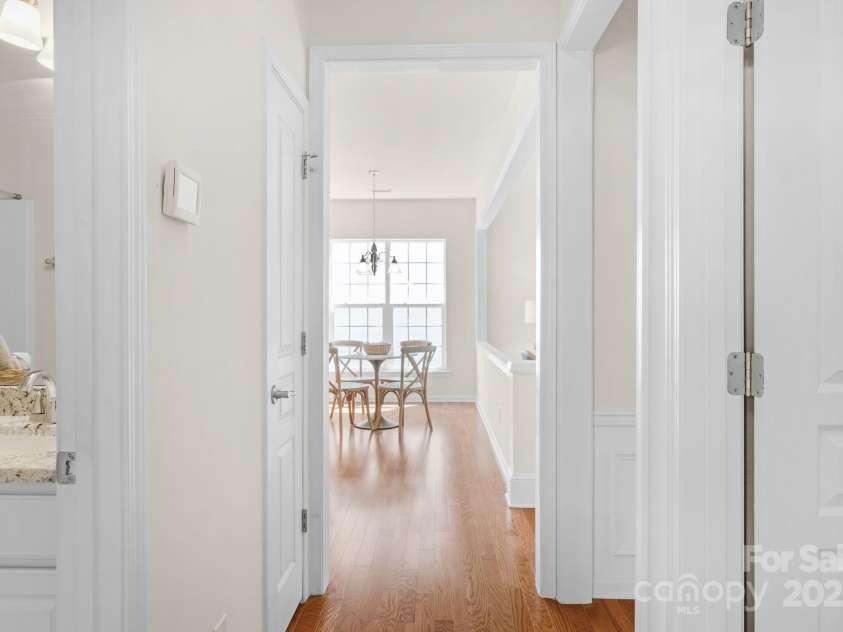 2136 Ashley River Road, Waxhaw, NC 28173.  MLS# CAR4243691, YatesRealty ID 6919. View from secondary bedroom. Laundry on the right; secondary full bath on the left