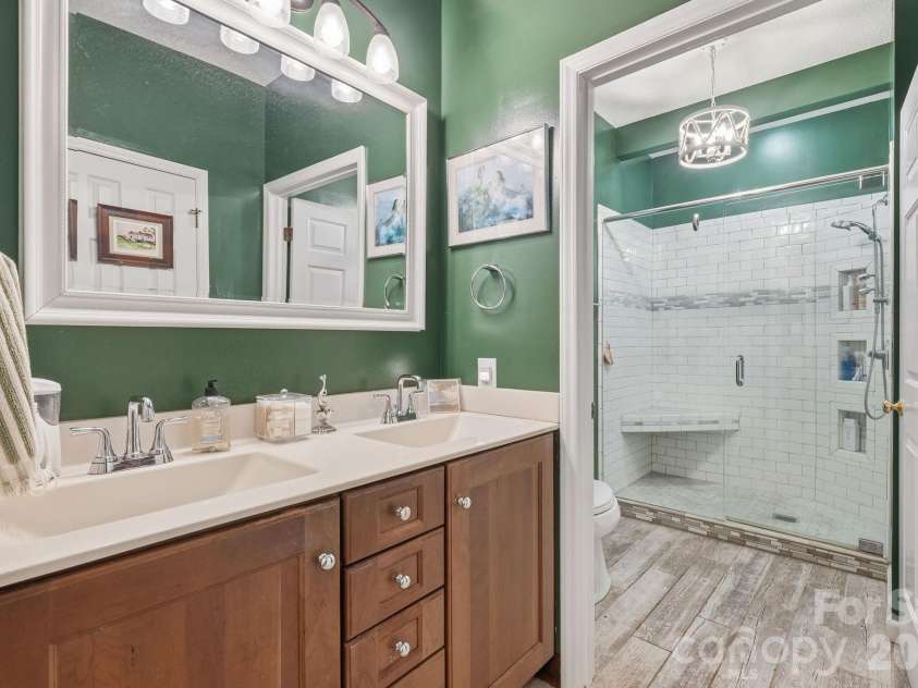 19986 Oak Leaf Circle, Cornelius, NC 28031.  MLS# CAR4342985, YatesRealty ID 6925. Renovated Primary Bathroom