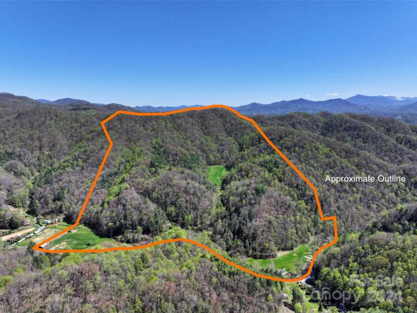 2180 Pigeon Roost Road, Green Mountain, NC 28740.  MLS# CAR4137054, YatesRealty ID 693. Approximate outline using GIS data, showing two pastures and the hidden meadow above them
