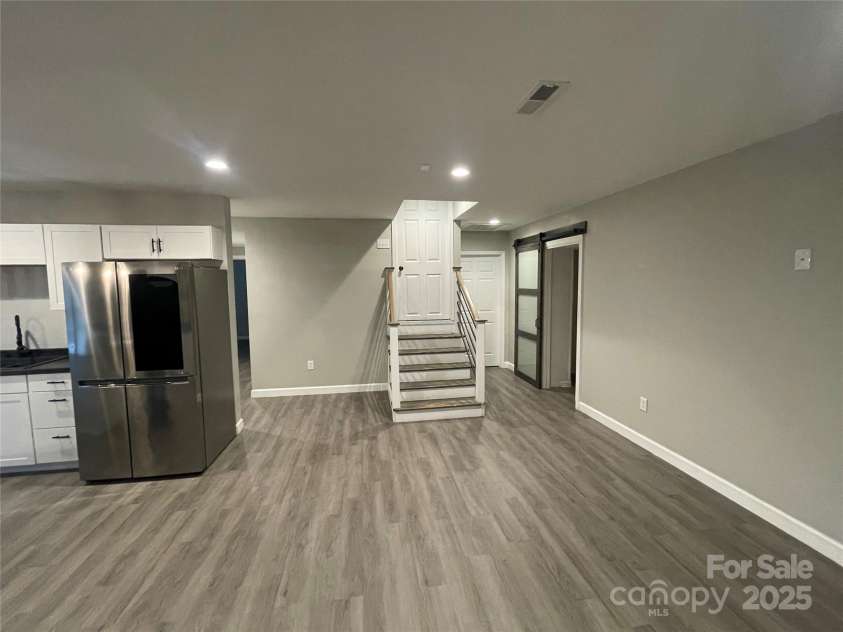 75 Landis Road, Marion, NC 28752.  MLS# CAR4215222, YatesRealty ID 693. Downstairs area, could be used as an apartment