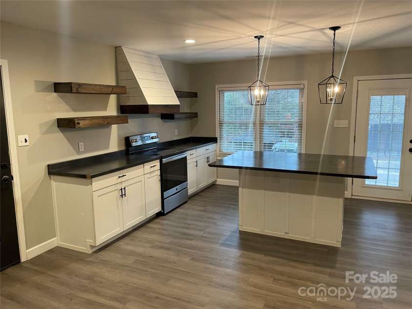 75 Landis Road, Marion, NC 28752.  MLS# CAR4215222, YatesRealty ID 693. Downstairs kitchen