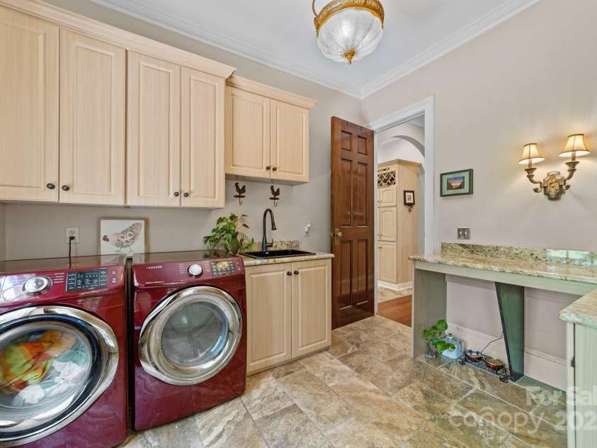 1090 Saunders Drive, Catawba, NC 28609.  MLS# CAR4212702, YatesRealty ID 6931. Large laundry room with separate entrance from the wrap around porch