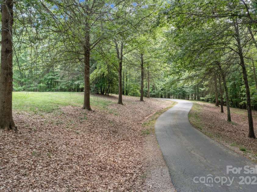 1090 Saunders Drive, Catawba, NC 28609.  MLS# CAR4212702, YatesRealty ID 6931. Tree lined drive