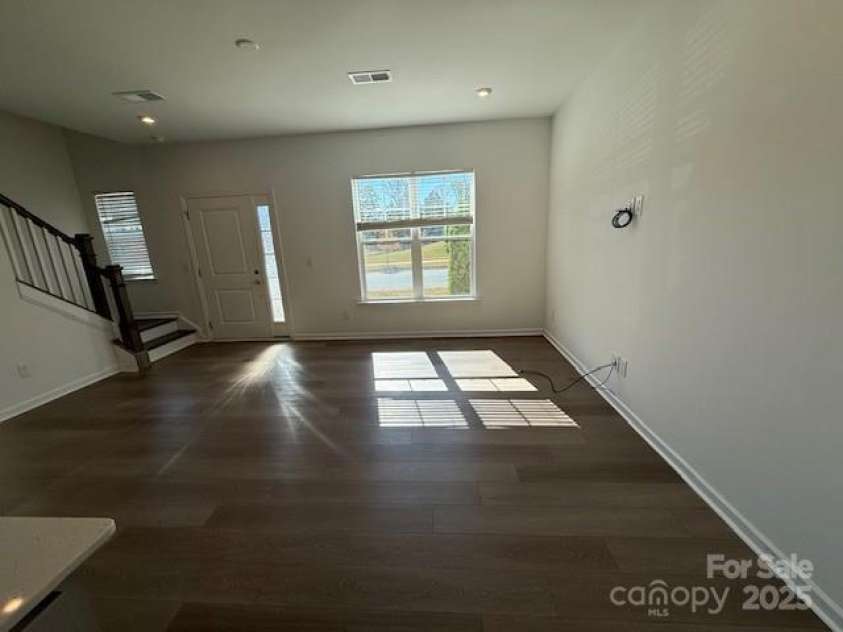 16401 Leading Street, Charlotte, NC 28273.  MLS# CAR4321346, YatesRealty ID 694. Living room from Kitchen