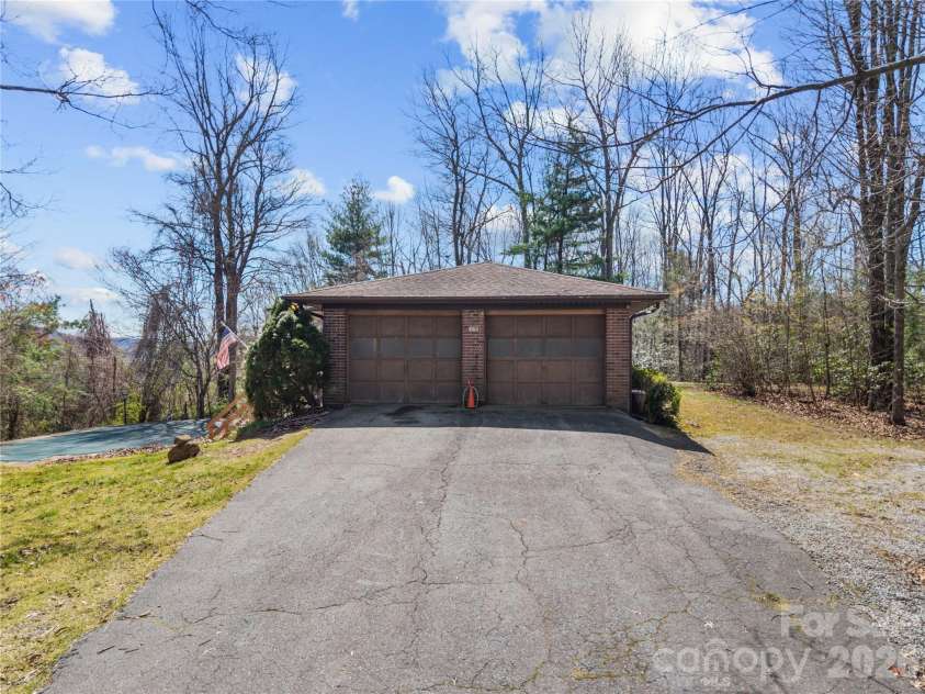 1086 Mine Gap Road, Zirconia, NC 28790.  MLS# CAR4361946, YatesRealty ID 6943. Attached Garage