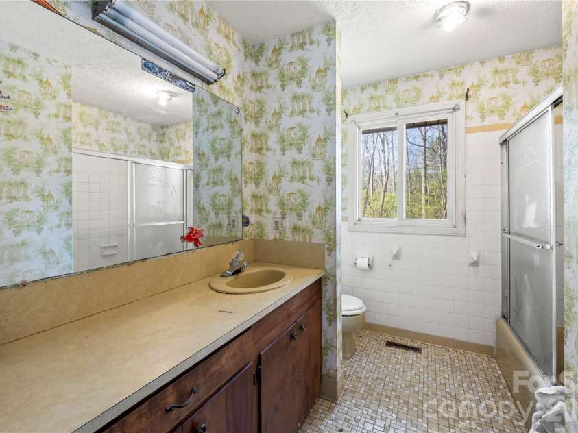 1086 Mine Gap Road, Zirconia, NC 28790.  MLS# CAR4361946, YatesRealty ID 6943. Bathroom