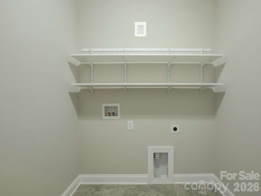 521 Trillium Way, Belmont, NC 28012.  MLS# CAR4314803, YatesRealty ID 6944. Laundry Room on first floor