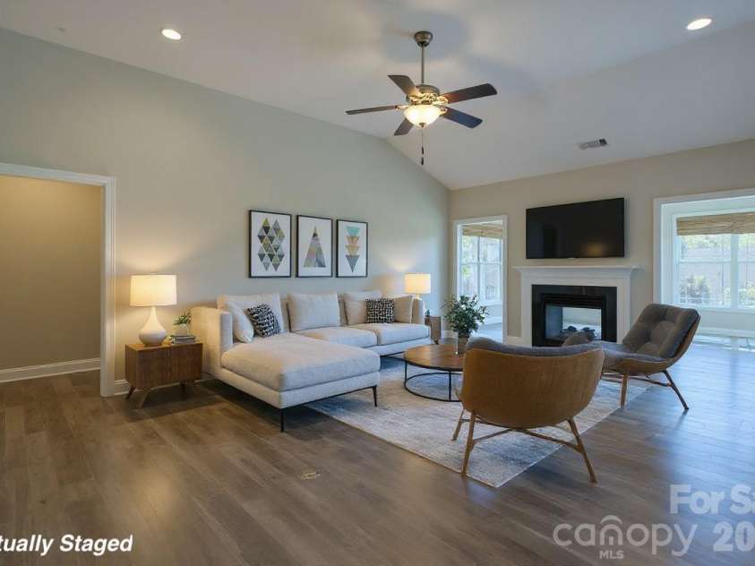 521 Trillium Way, Belmont, NC 28012.  MLS# CAR4314803, YatesRealty ID 6944. Living room flows into sunroom