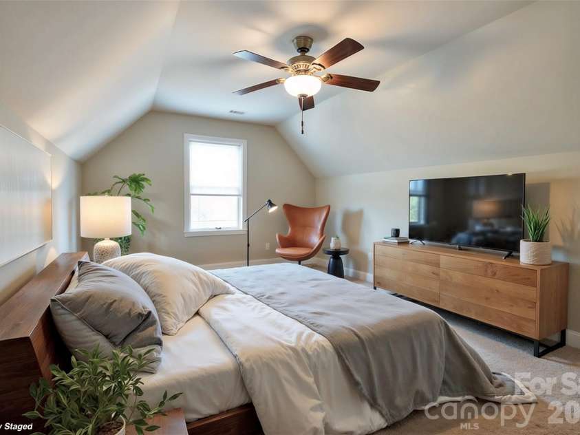 521 Trillium Way, Belmont, NC 28012.  MLS# CAR4314803, YatesRealty ID 6944. Spacious second floor bonus room virtually staged as bedroom