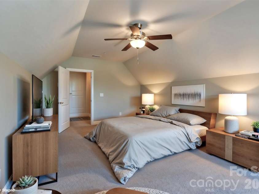 521 Trillium Way, Belmont, NC 28012.  MLS# CAR4314803, YatesRealty ID 6944. Spacious second floor bonus room virtually staged as bedroom